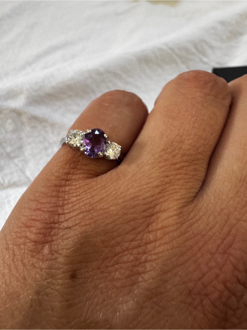 Amethyst Centerstone Three-Stone Ring in Purple and Silver